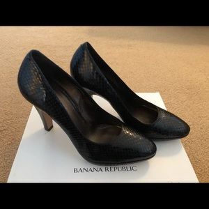 Black embossed heels